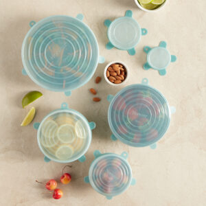 23527c89af31b443e72ec6af2719def787cc8e83.jpg Norwex Stretchy Silicone Lids - teal