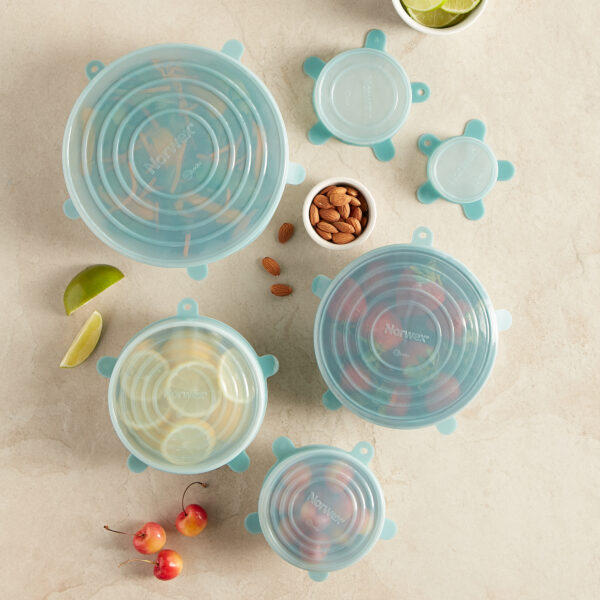 23527c89af31b443e72ec6af2719def787cc8e83.jpg Norwex Stretchy Silicone Lids - teal