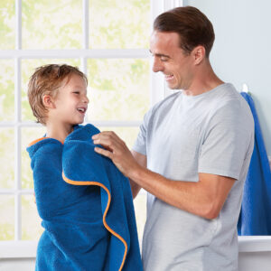 e2f9c4fdfefcd379fe691313781f1add22169727.jpg Norwex Kids Towel - royal blue with orange trim